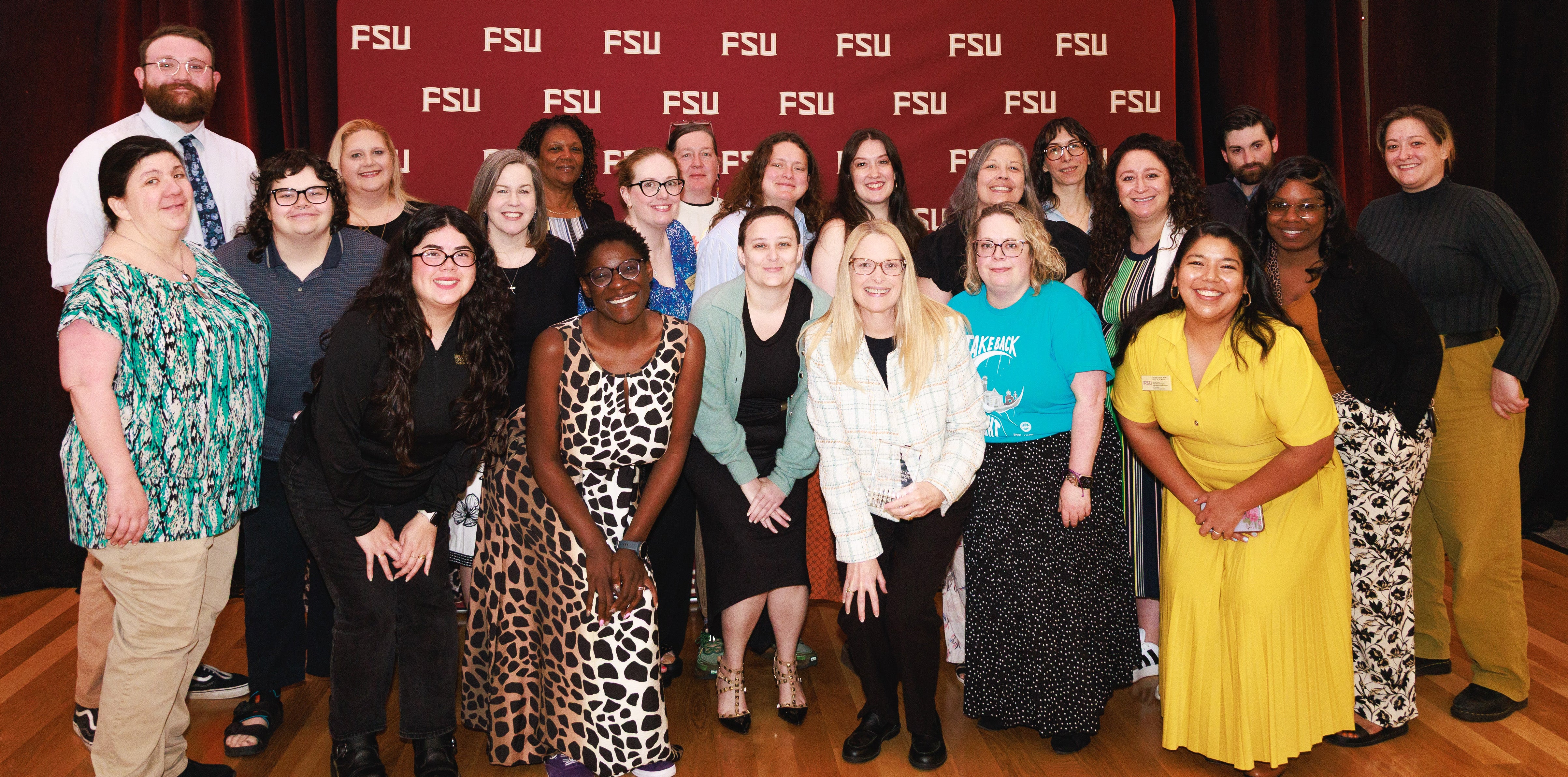 40 people smiling in a group from DSST