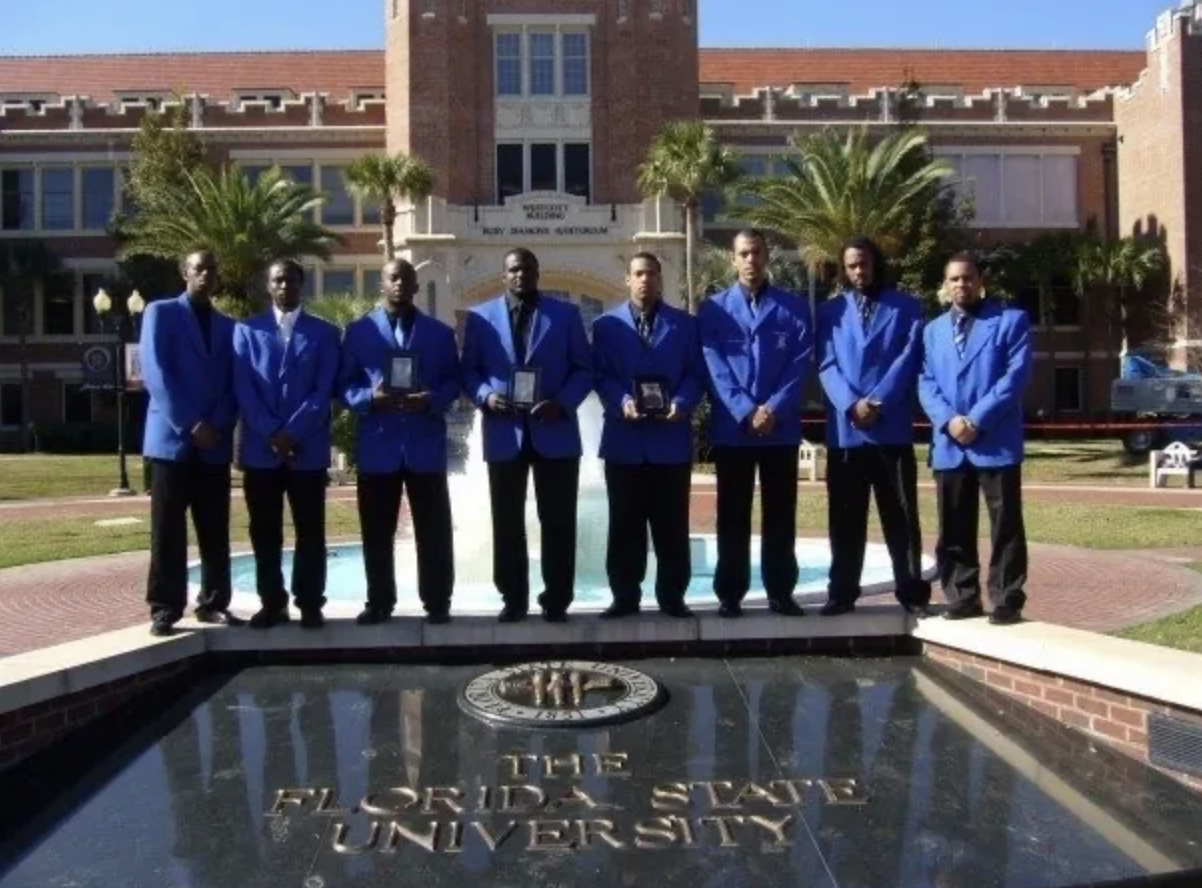 group of students pose by the Westcott Fountain